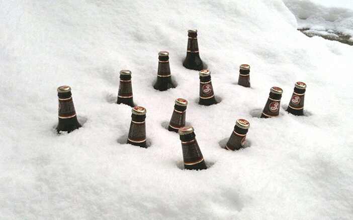 beer bottles in the snow