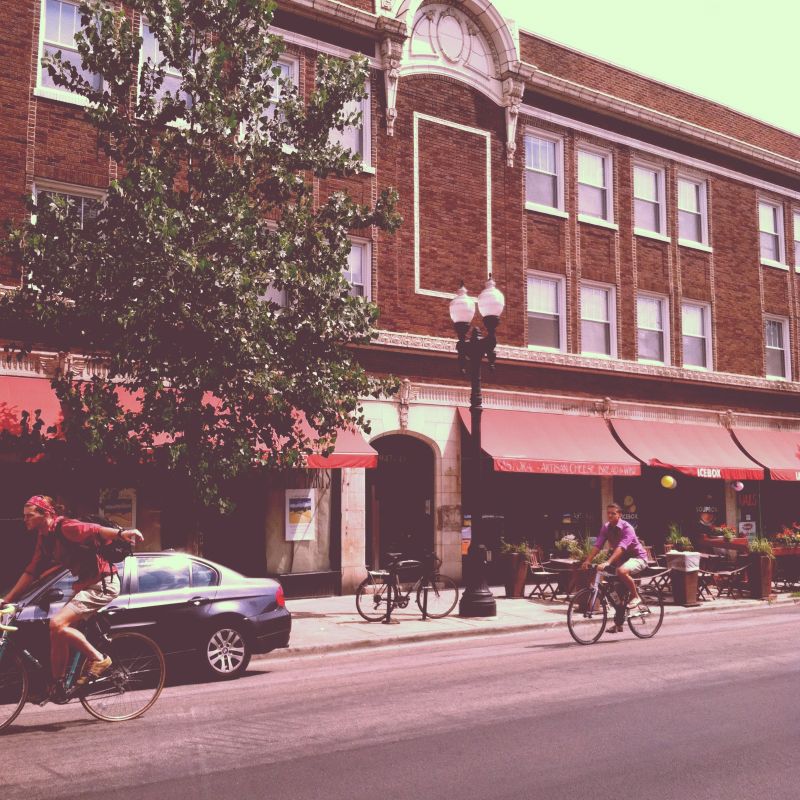 Prople Ride A Bicycle On The Street