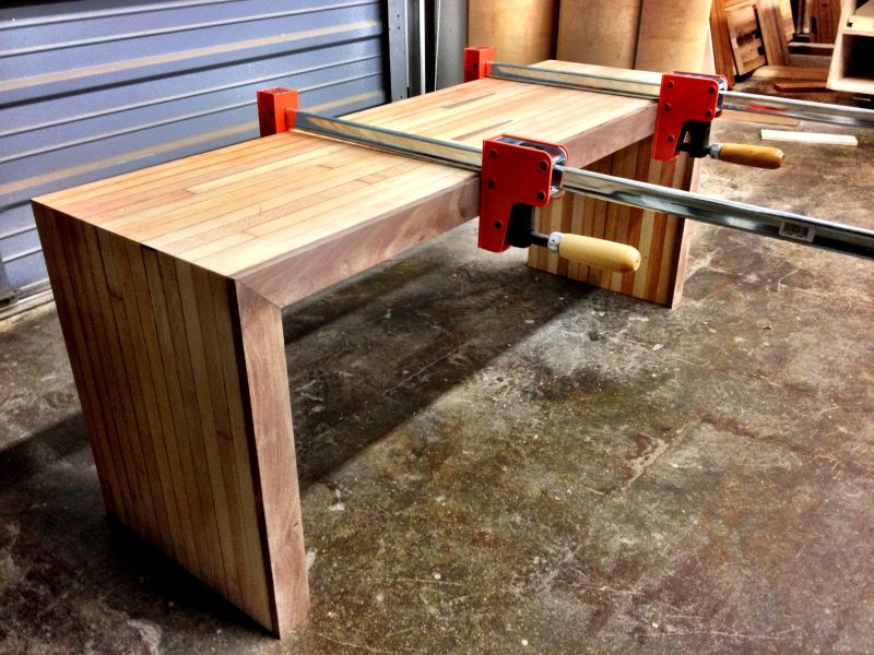 table is resting in clamps