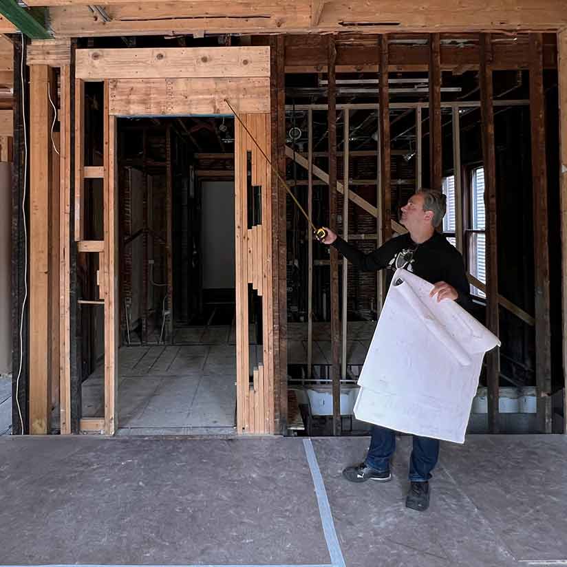 Person Holding Construction Documents